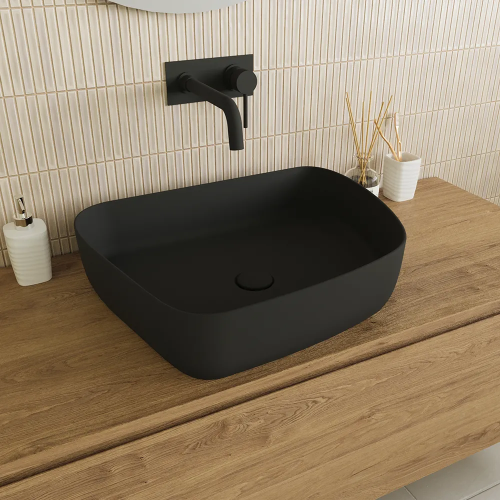 Lavabo da appoggio tondo 55,5x44x14 nero opaco | Persico Lavabo da appoggio tondo 55,5x44x14 nero opaco | Persico