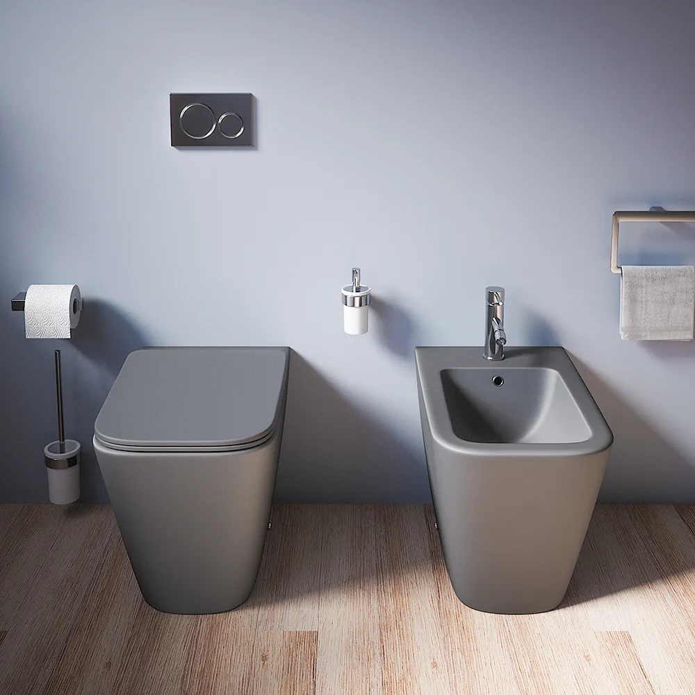 Coppia sanitari in ceramica filomuro vaso rimless, bidet e copri-wc grigio opaco | Kyoto Coppia sanitari in ceramica filomuro vaso rimless, bidet e copri-wc grigio opaco | Kyoto