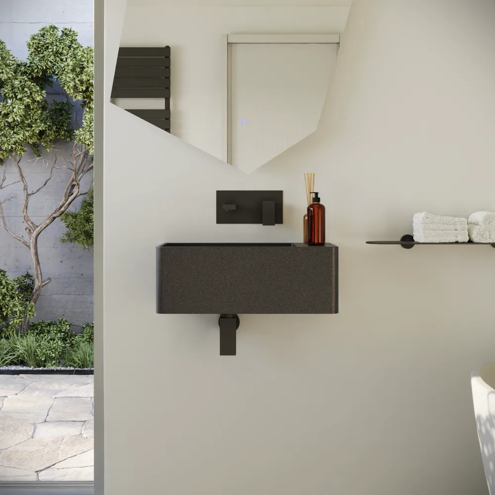 Lavabo sospeso a muro rettangolare in microcemento 55x23x20 cm nero foro a destra | Kanas