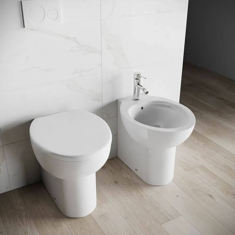 Sanitari filomuro in ceramica bianco lucido: vaso bidet e copriwc soft-close | Doha Sanitari filomuro in ceramica bianco lucido: vaso bidet e copriwc soft-close | Doha