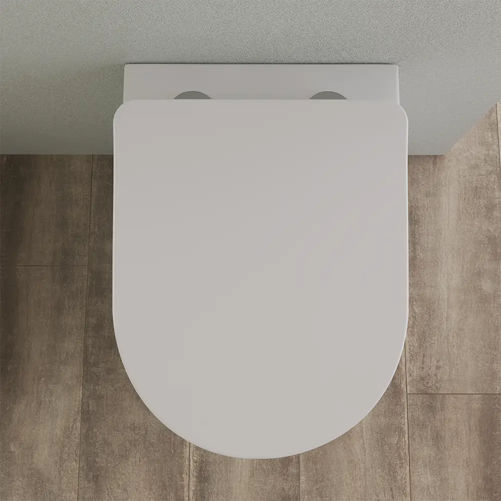 Vista superiore frontale del vaso WC filomuro in ceramica senza brida mod. Praga Vista superiore frontale del vaso WC filomuro in ceramica senza brida mod. Praga