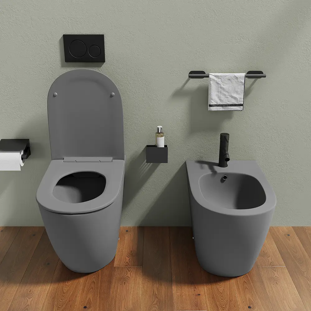 Sanitari filomuro in ceramica grigio opaco vaso rimless con copriwc soft-close e bidet | Europa Sanitari filomuro in ceramica grigio opaco vaso rimless con copriwc soft-close e bidet | Europa