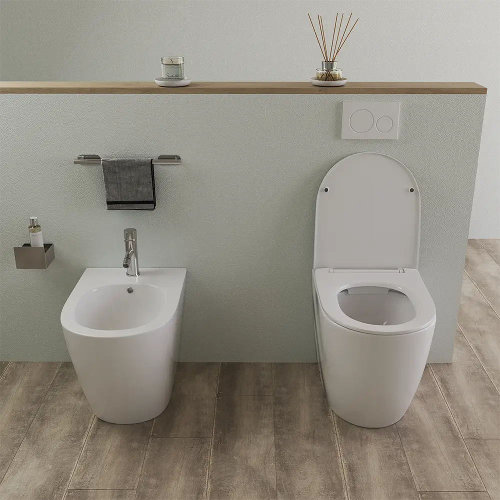 Coppia di sanitari in ceramica con sedile soft close aperto mod. praga Coppia di sanitari in ceramica con sedile soft close aperto mod. praga