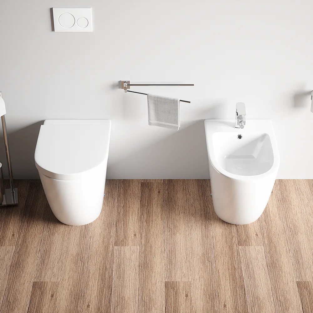 Sanitari filo muro in ceramica senza brida vaso traslato + bidet + sedile soft-close | Roma Sanitari filo muro in ceramica senza brida vaso traslato + bidet + sedile soft-close | Roma