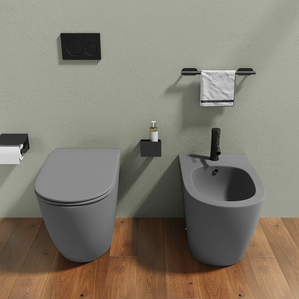 Sanitari filomuro in ceramica grigio opaco vaso rimless con copriwc soft-close e bidet | Europa Sanitari filomuro in ceramica grigio opaco vaso rimless con copriwc soft-close e bidet | Europa