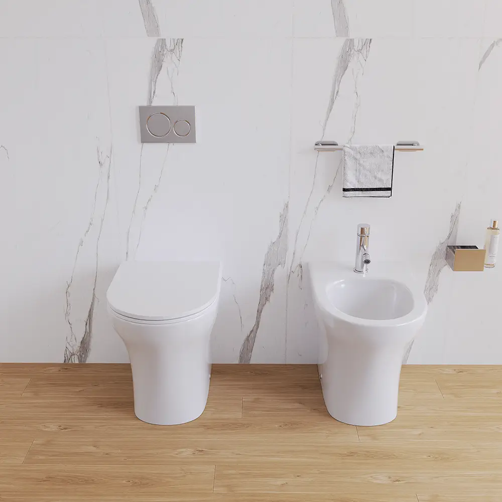 Sanitari filomuro rimless in ceramica bianco lucido: vaso bidet e copriwc soft-close | Nassau Sanitari filomuro rimless in ceramica bianco lucido: vaso bidet e copriwc soft-close | Nassau