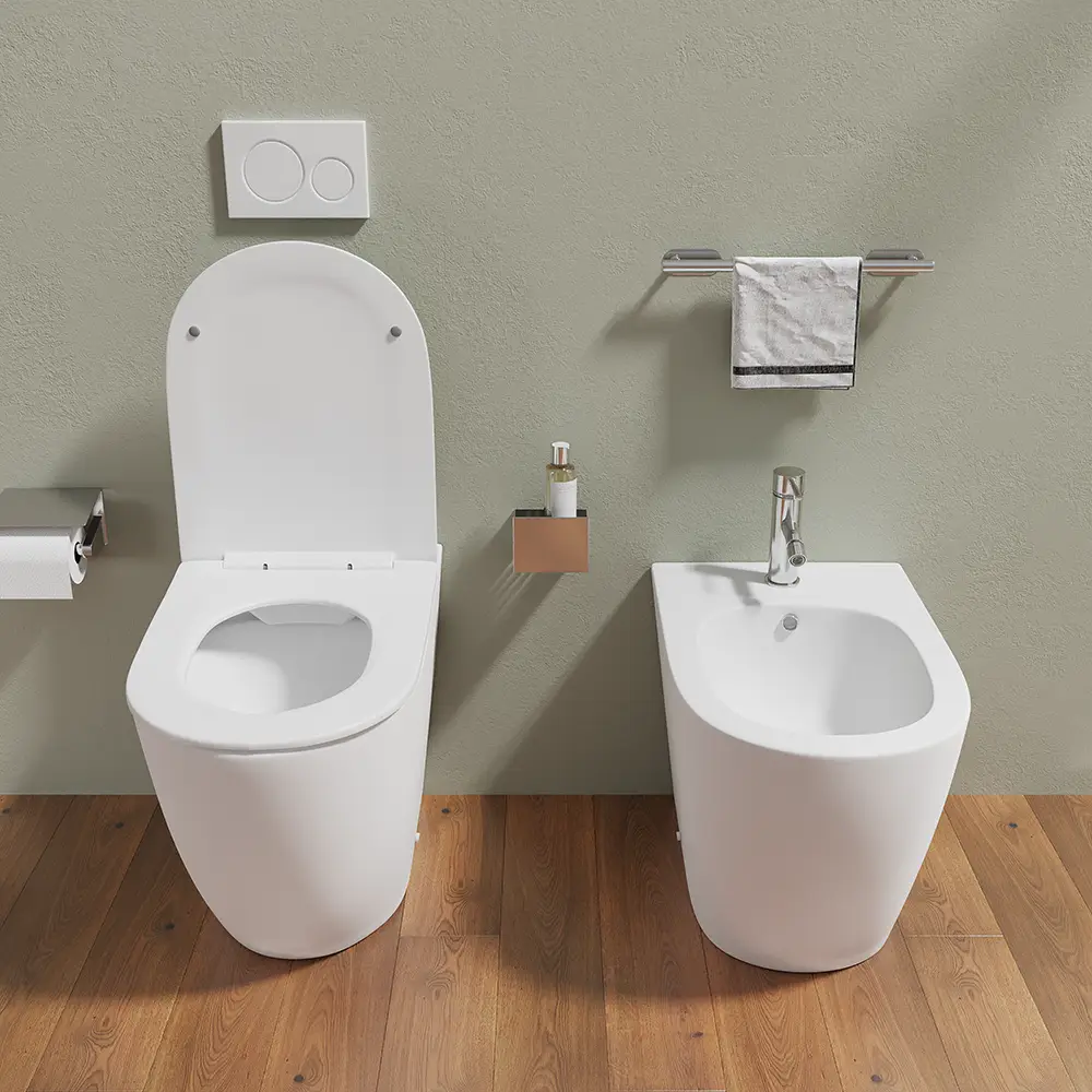Sanitari filomuro in ceramica bianco opaco vaso rimless con copriwc soft-close e bidet | Europa Sanitari filomuro in ceramica bianco opaco vaso rimless con copriwc soft-close e bidet | Europa