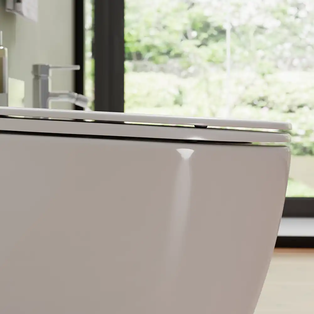 Sanitari filomuro in ceramica wc+bidet rimless mod. Europa bianco lucido - Dettaglio forma tondeggiante Sanitari filomuro in ceramica wc+bidet rimless mod. Europa bianco lucido - Dettaglio forma tondeggiante