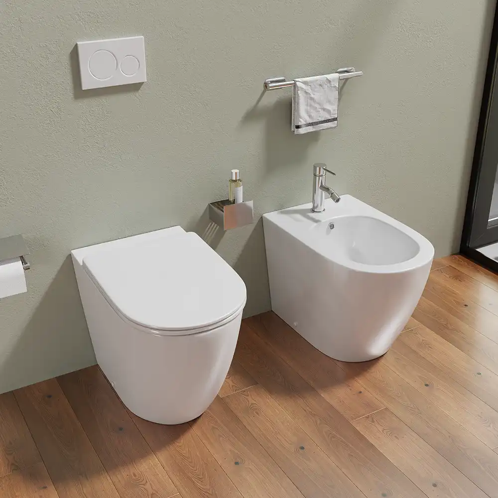 Sanitari filomuro in ceramica wc+bidet rimless mod. Europa bianco lucido - Vista alto Sanitari filomuro in ceramica wc+bidet rimless mod. Europa bianco lucido - Vista alto