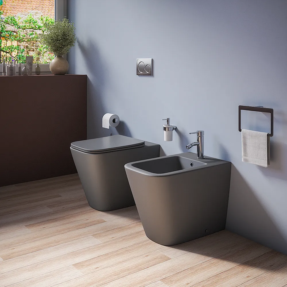 Coppia sanitari in ceramica filomuro vaso rimless, bidet e copri-wc grigio opaco | Kyoto Coppia sanitari in ceramica filomuro vaso rimless, bidet e copri-wc grigio opaco | Kyoto