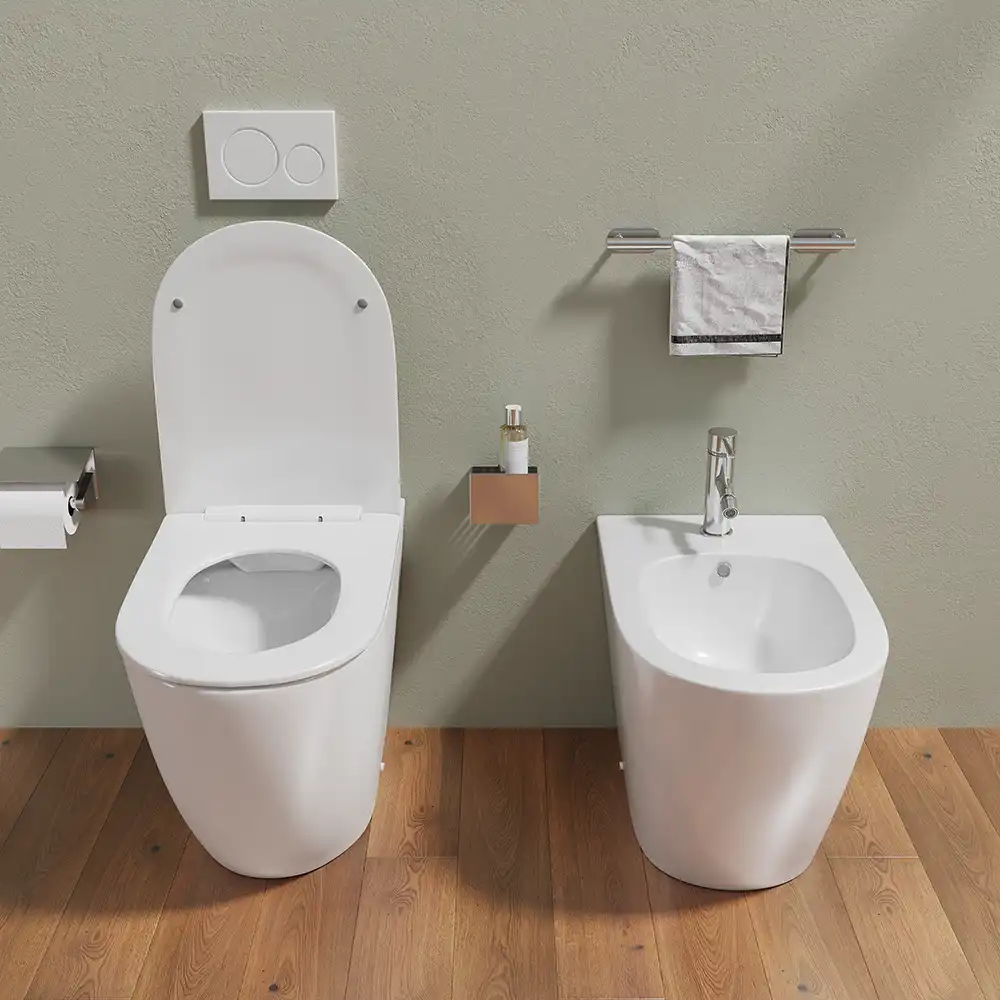 Sanitari filomuro in ceramica wc+bidet rimless mod. Europa bianco lucido - Vista frontale con copri-wc aperto Sanitari filomuro in ceramica wc+bidet rimless mod. Europa bianco lucido - Vista frontale con copri-wc aperto