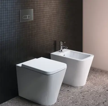 IDEAL STANDARD Coppia di sanitari filomuro: Bidet e Wc con sedile avvolgente Soft-Close | Blend Cube IDEAL STANDARD Coppia di sanitari filomuro: Bidet e Wc con sedile avvolgente Soft-Close | Blend Cube