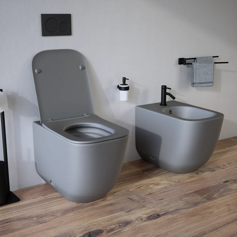 Sanitari filomuro in ceramica grigio opaco vaso tornado silent flush sedile soft-close e bidet | Riga Sanitari filomuro in ceramica grigio opaco vaso tornado silent flush sedile soft-close e bidet | Riga
