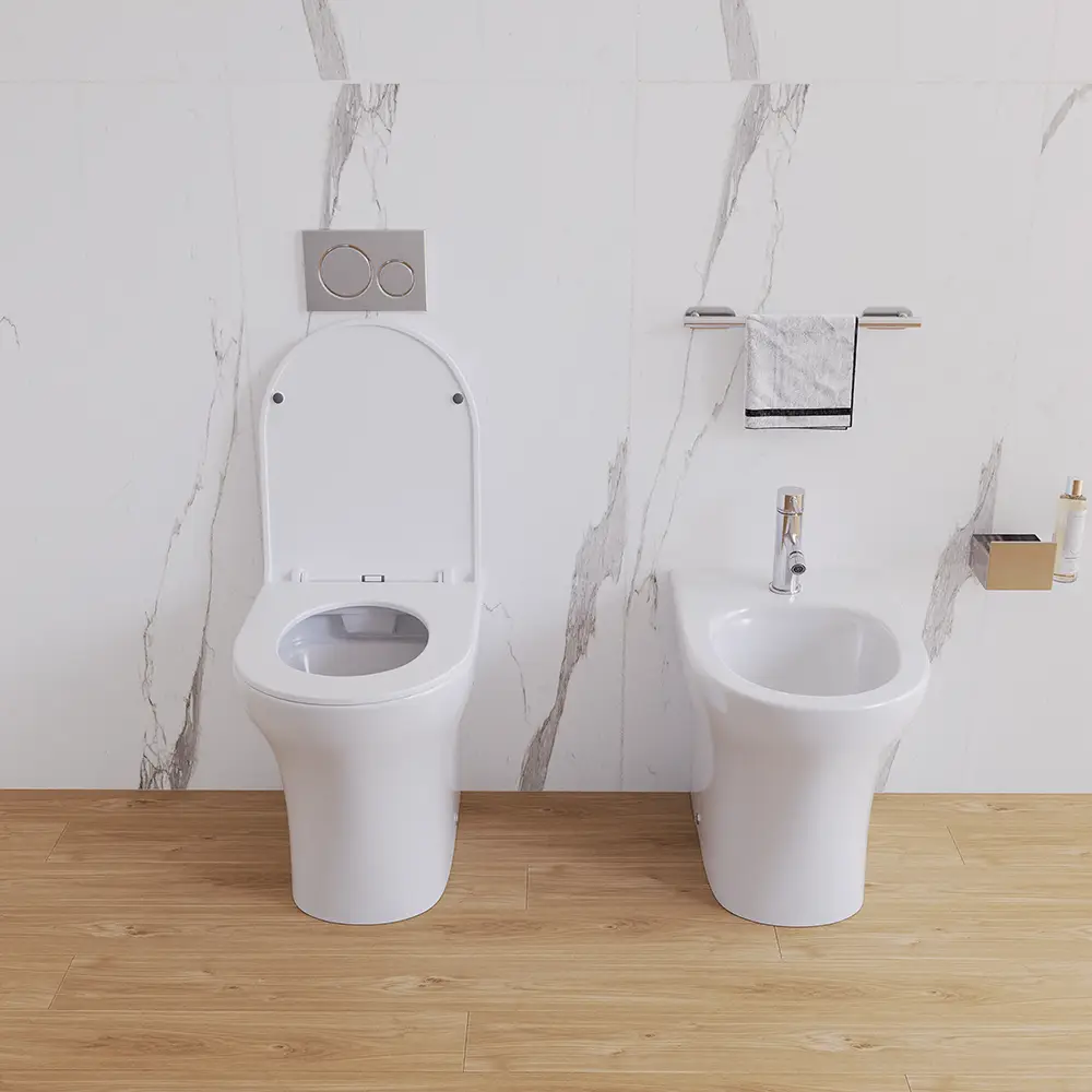 Sanitari filomuro rimless in ceramica bianco lucido: vaso bidet e copriwc soft-close | Nassau Sanitari filomuro rimless in ceramica bianco lucido: vaso bidet e copriwc soft-close | Nassau